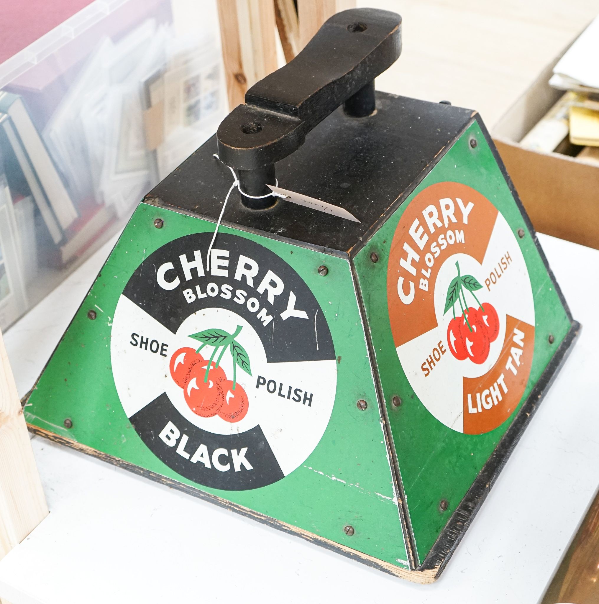 A Cherry Blossom Shoe Polish advertising shoe stand